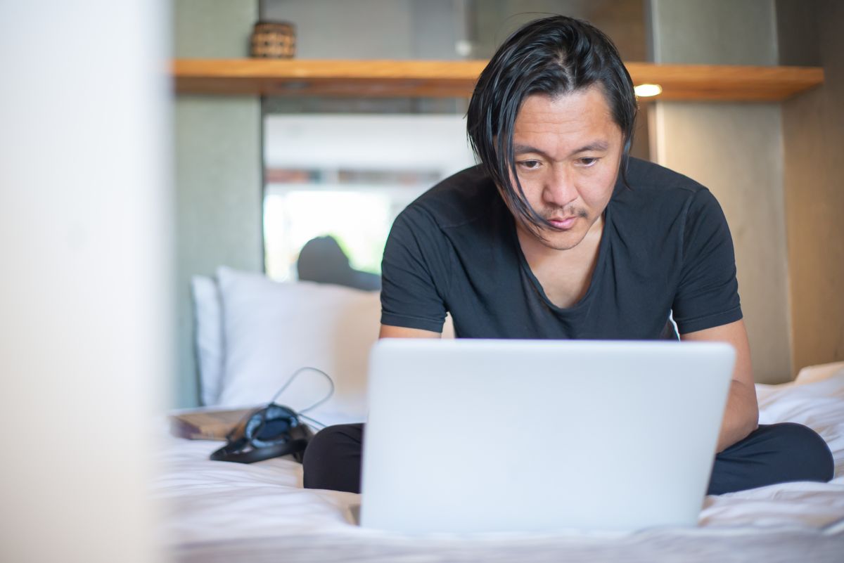 Freelancer working on a laptop from home
